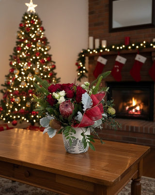 Tis the Season to Be Jolly — And to Fill Your Doors (and Homes!) With Flowers